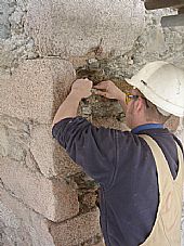 Laing traditional Masonry Ltd repairing a wall